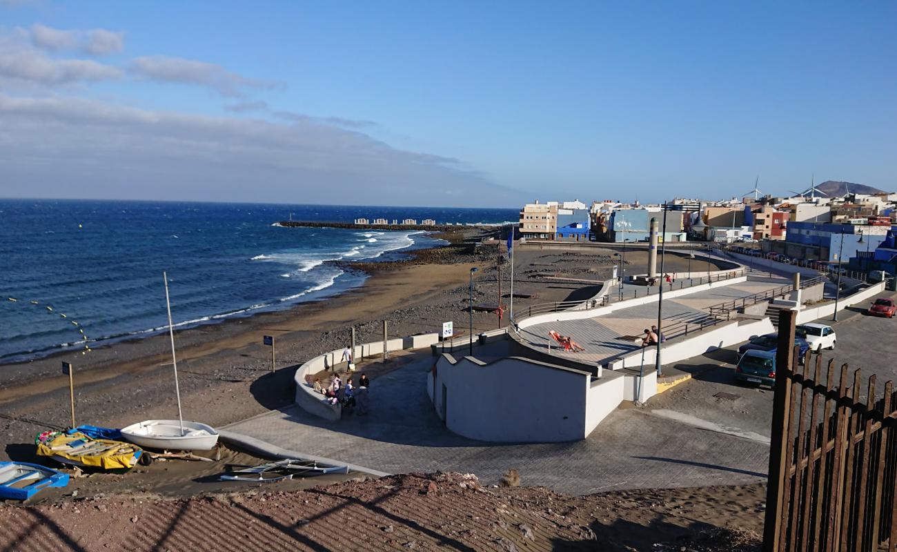 Playa El Burrero'in fotoğrafı siyah kum ve çakıllar yüzey ile