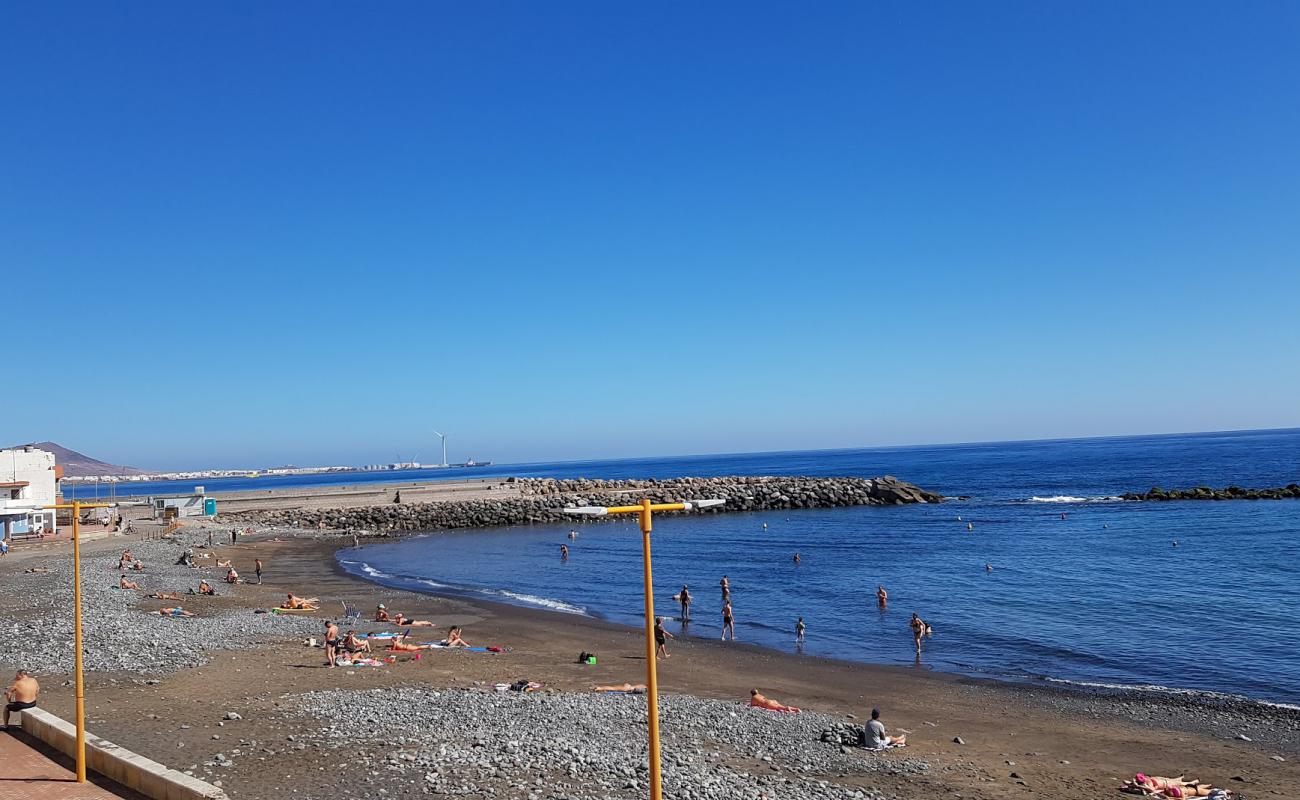 Playa de Pozo Izquierdo'in fotoğrafı siyah kum ve çakıllar yüzey ile