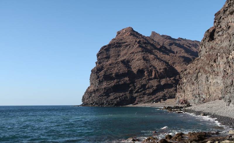Playa de Tasartico'in fotoğrafı taşlı kum yüzey ile