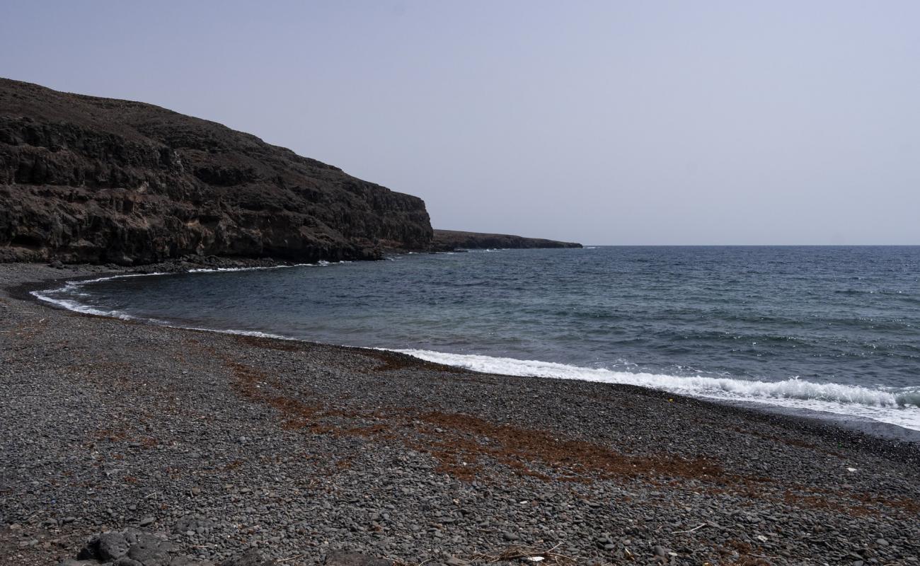 Playa de Leandro'in fotoğrafı taşlı kum yüzey ile