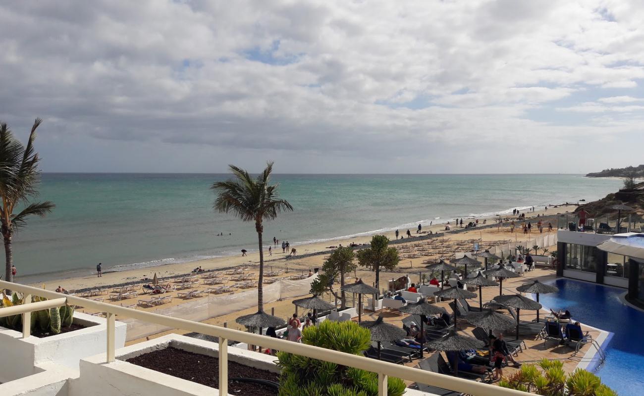 Playa de los Molinos'in fotoğrafı parlak kum ve kayalar yüzey ile