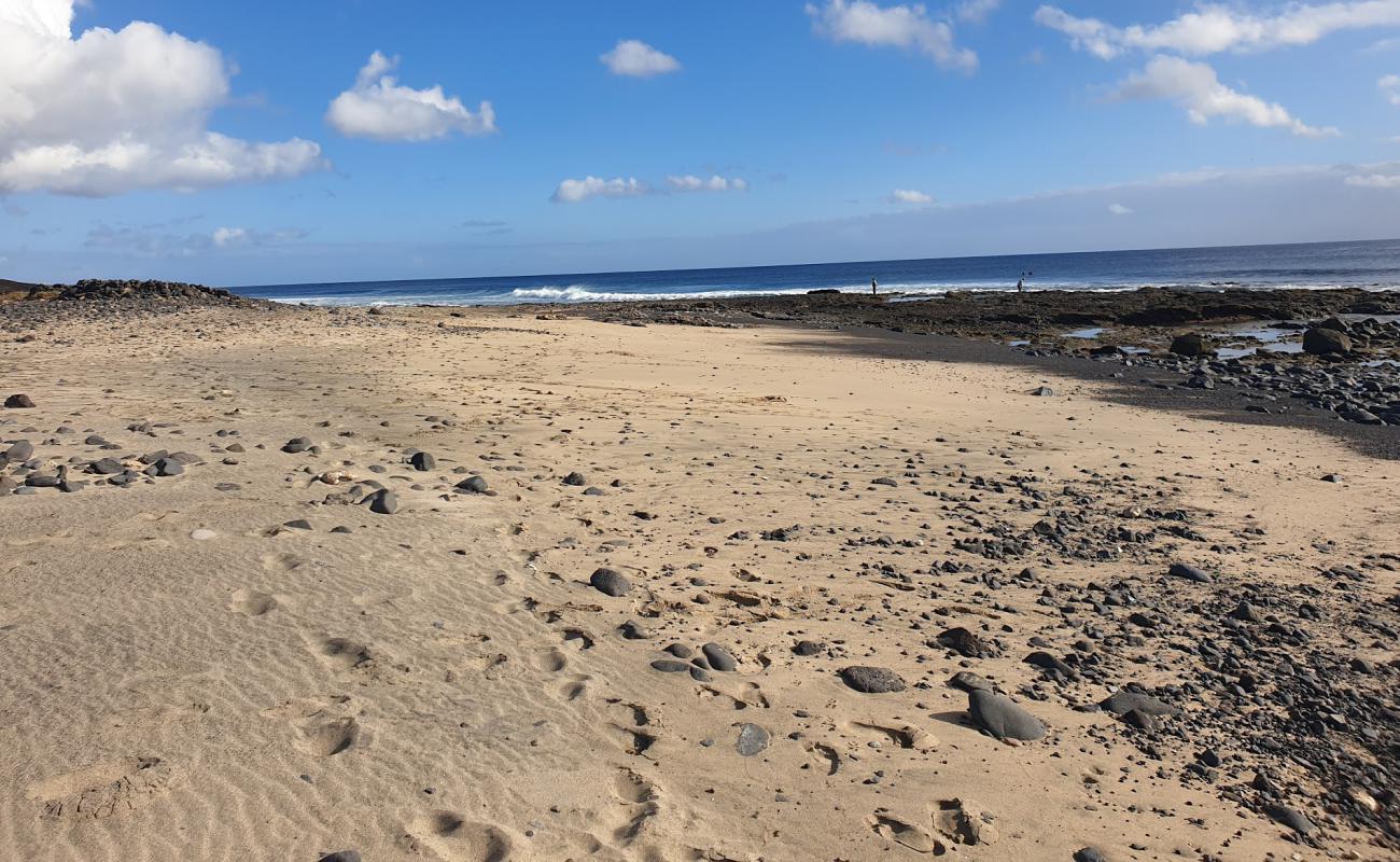 Playa Punta Salinas'in fotoğrafı bej kum ve kayalar yüzey ile