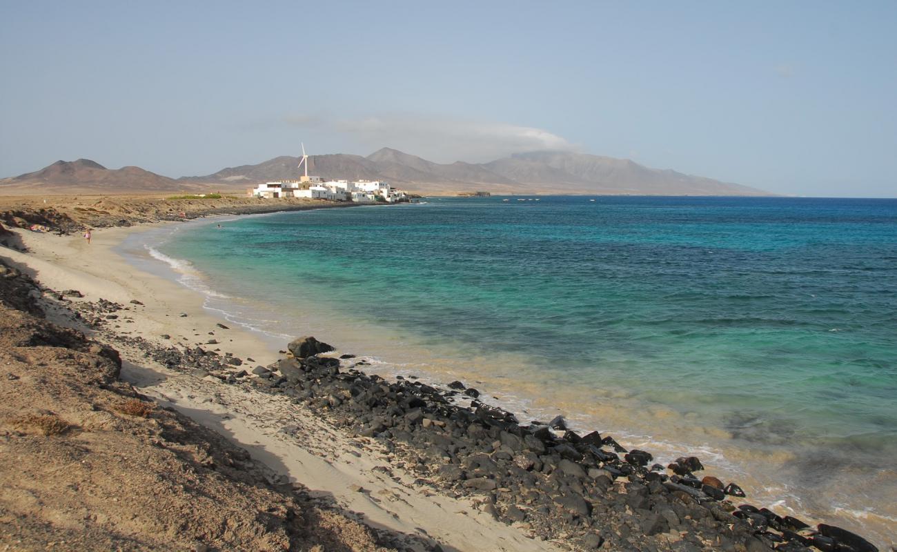 Playa "El Puertito"'in fotoğrafı bej kum ve kayalar yüzey ile