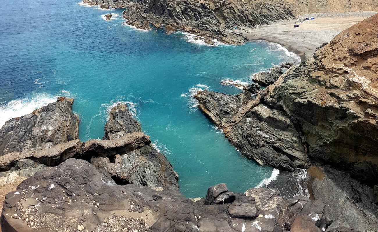 Playa de los Mozos'in fotoğrafı gri kum ve çakıllar yüzey ile