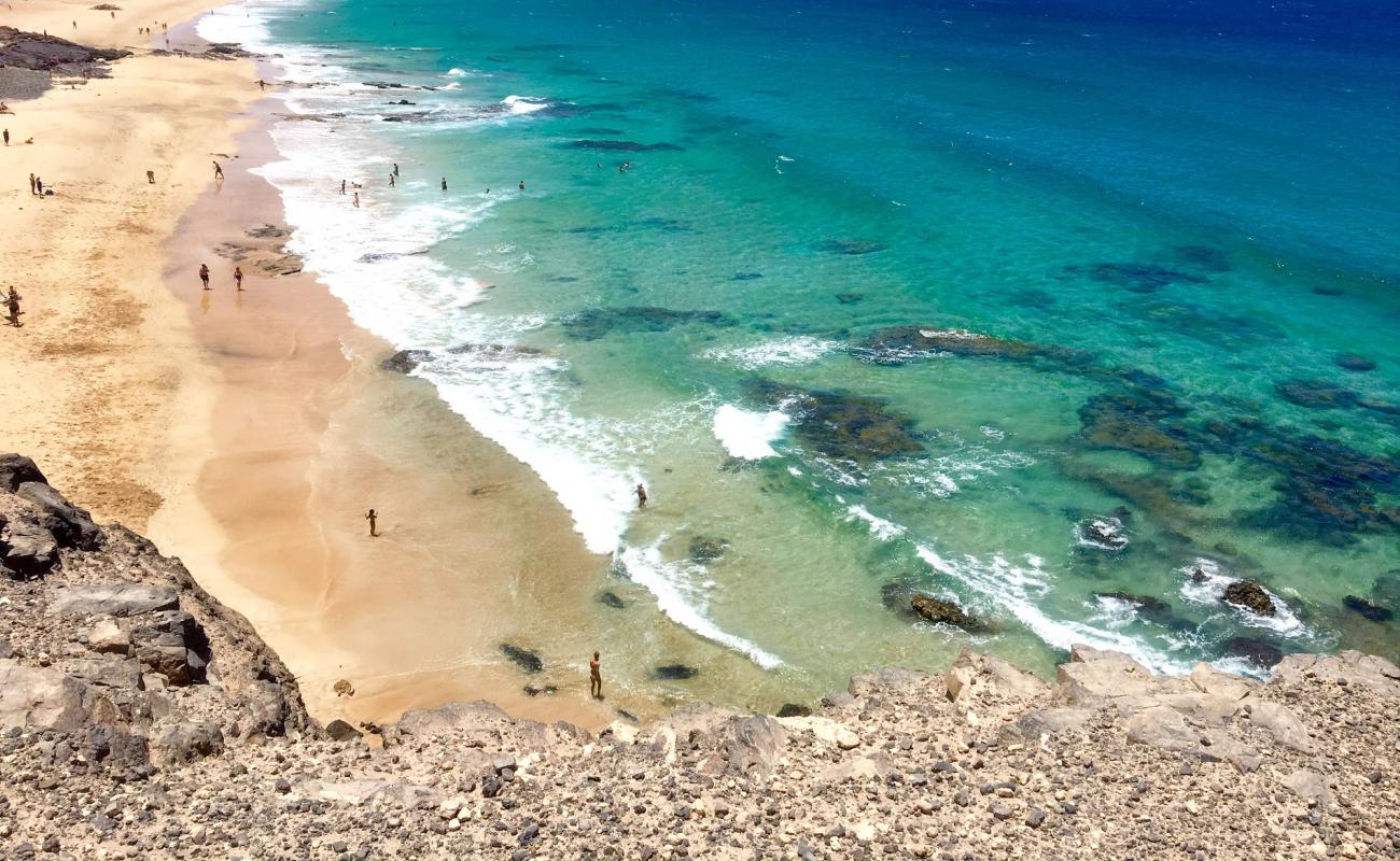 Playa del Castillo'in fotoğrafı parlak ince kum yüzey ile