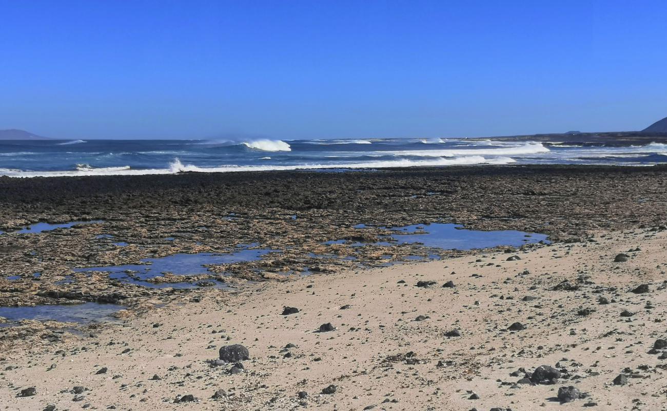 Caleta Salinas'in fotoğrafı bej kum ve kayalar yüzey ile
