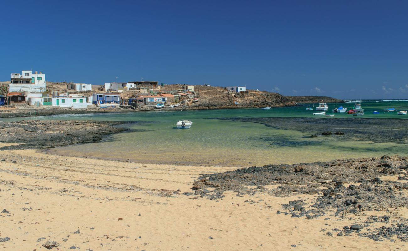 Playa El Majanicho'in fotoğrafı bej kum ve kayalar yüzey ile