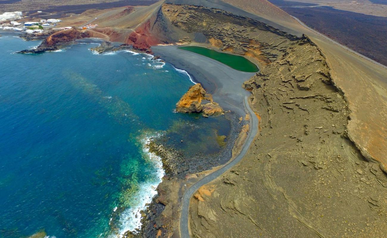 Playa de los Ciclos'in fotoğrafı siyah kum yüzey ile