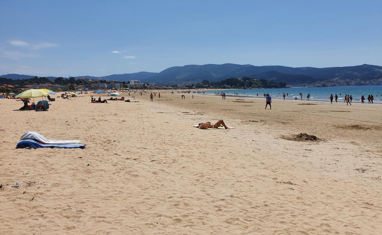 Praia de Panxon'in fotoğrafı parlak kum yüzey ile