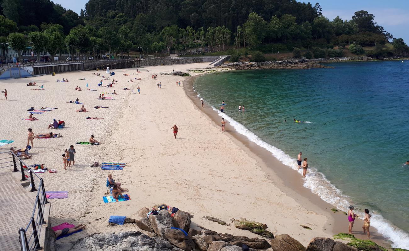 Praia de Portocelo'in fotoğrafı beyaz kum yüzey ile