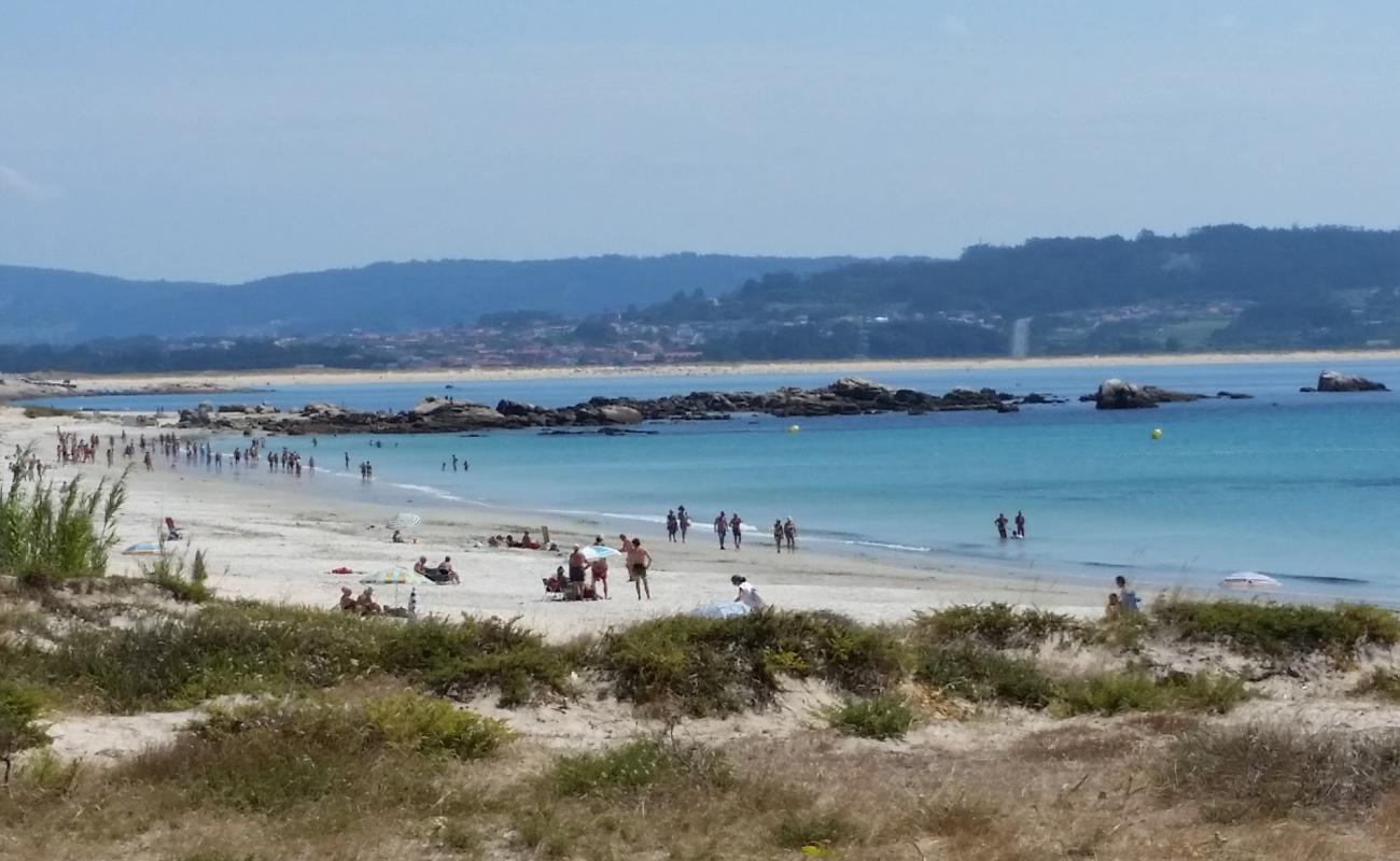 Area da Cruz beach'in fotoğrafı beyaz ince kum yüzey ile