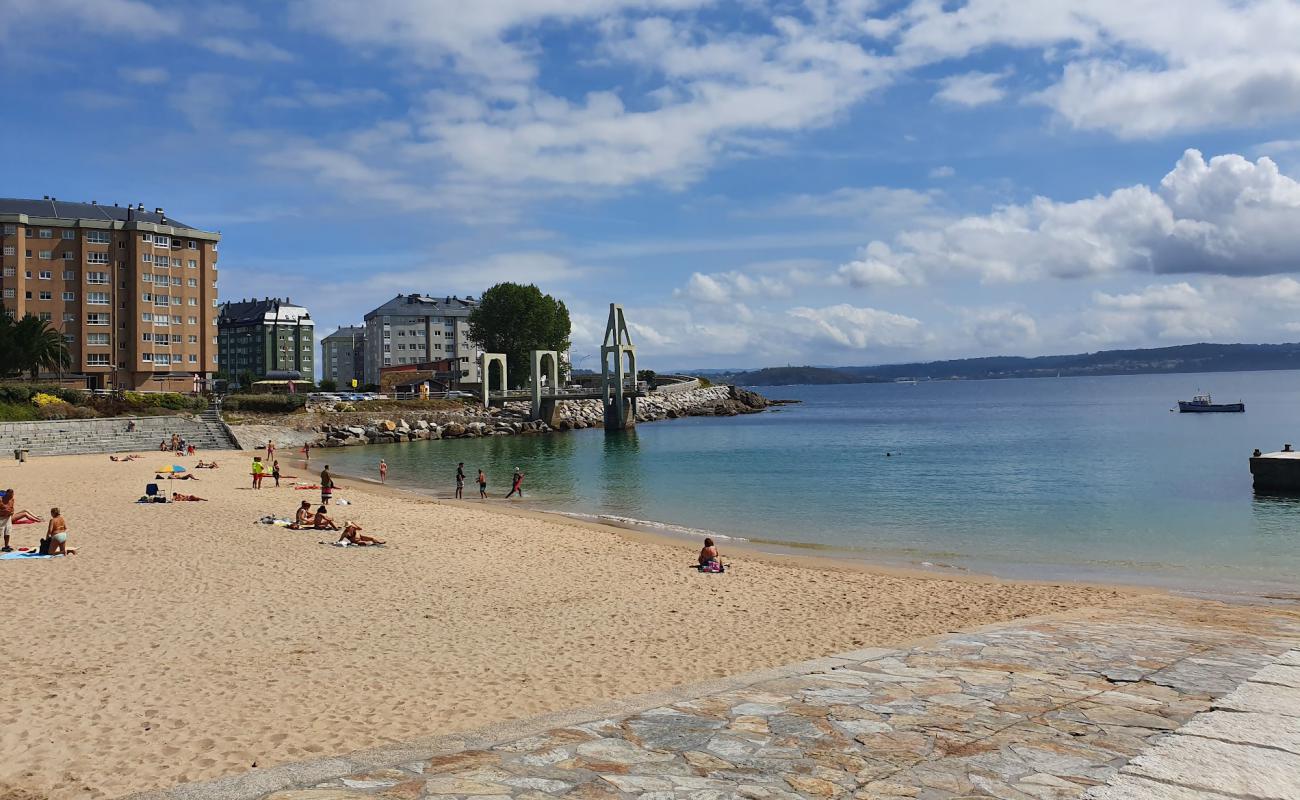 Praia de Adormideiras'in fotoğrafı beyaz kum yüzey ile