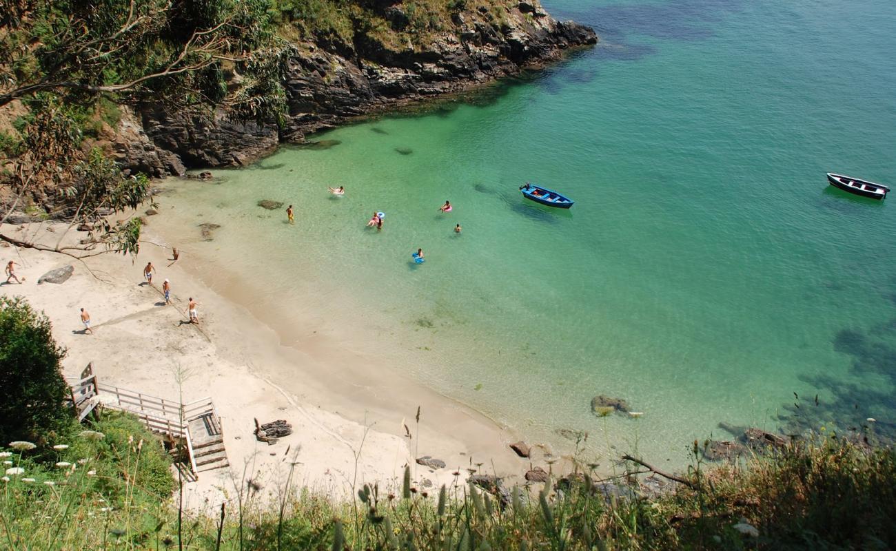 Cala Sonreiras'in fotoğrafı beyaz kum yüzey ile