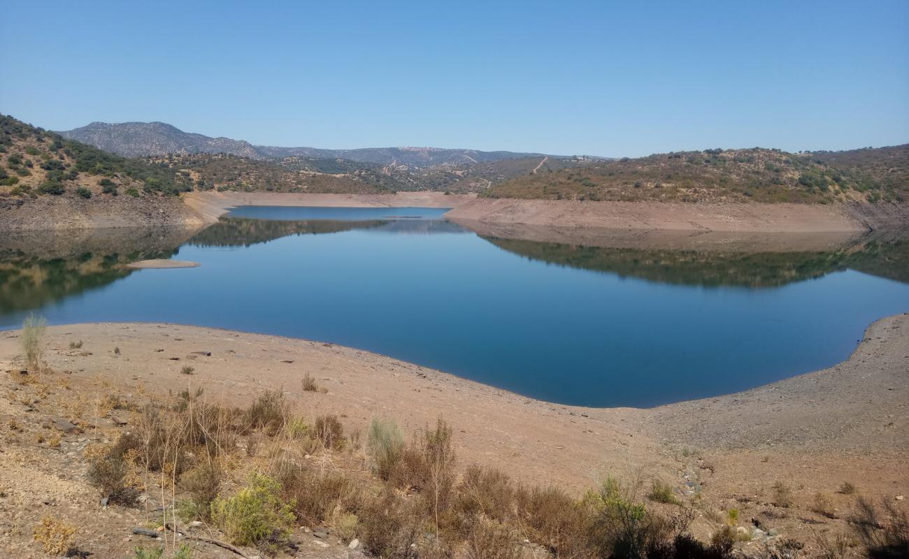 Playa del Tamujoso'in fotoğrafı parlak kum ve kayalar yüzey ile