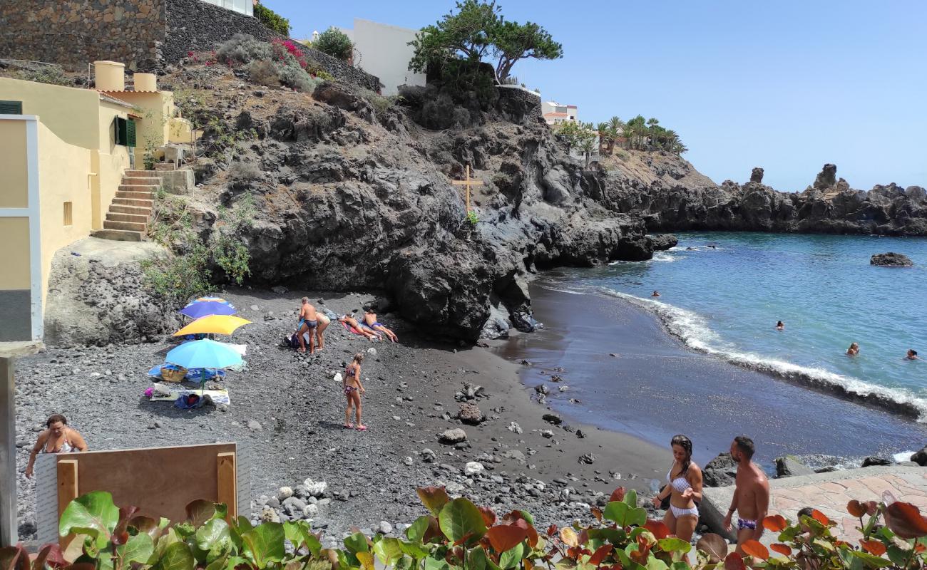 Alcala Plajı'in fotoğrafı taşlı kum yüzey ile