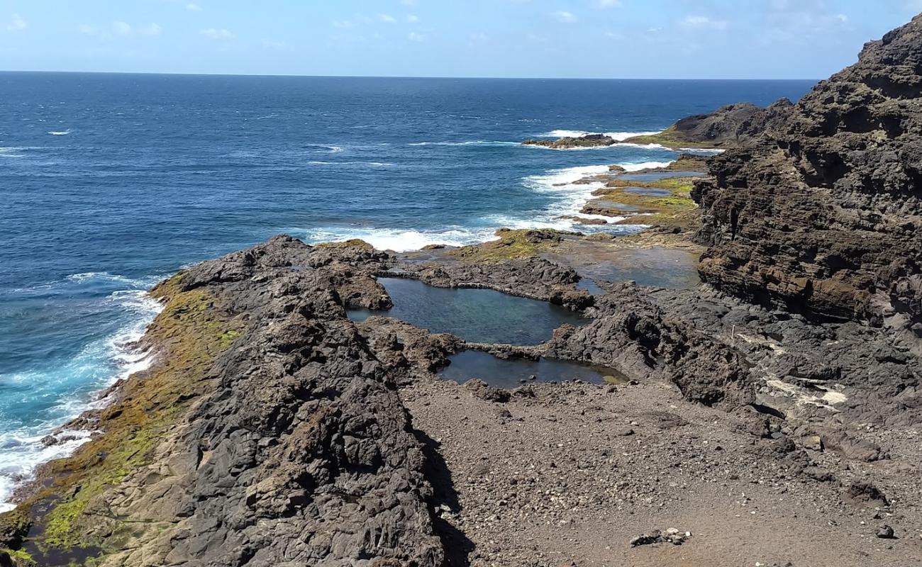 Playa Punta del Faro'in fotoğrafı kayalık arazi yüzey ile