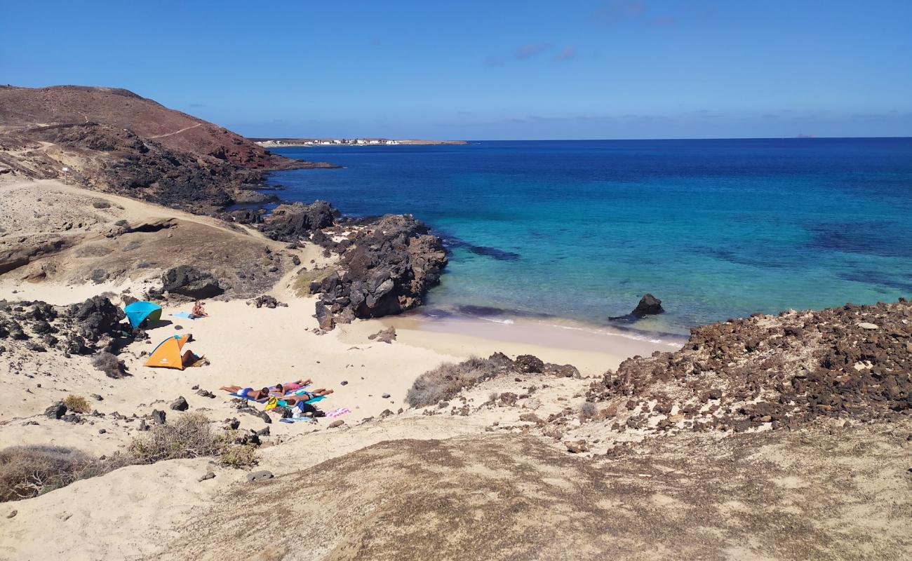 Playa Barranco de los Conejos'in fotoğrafı açık bej kum yüzey ile