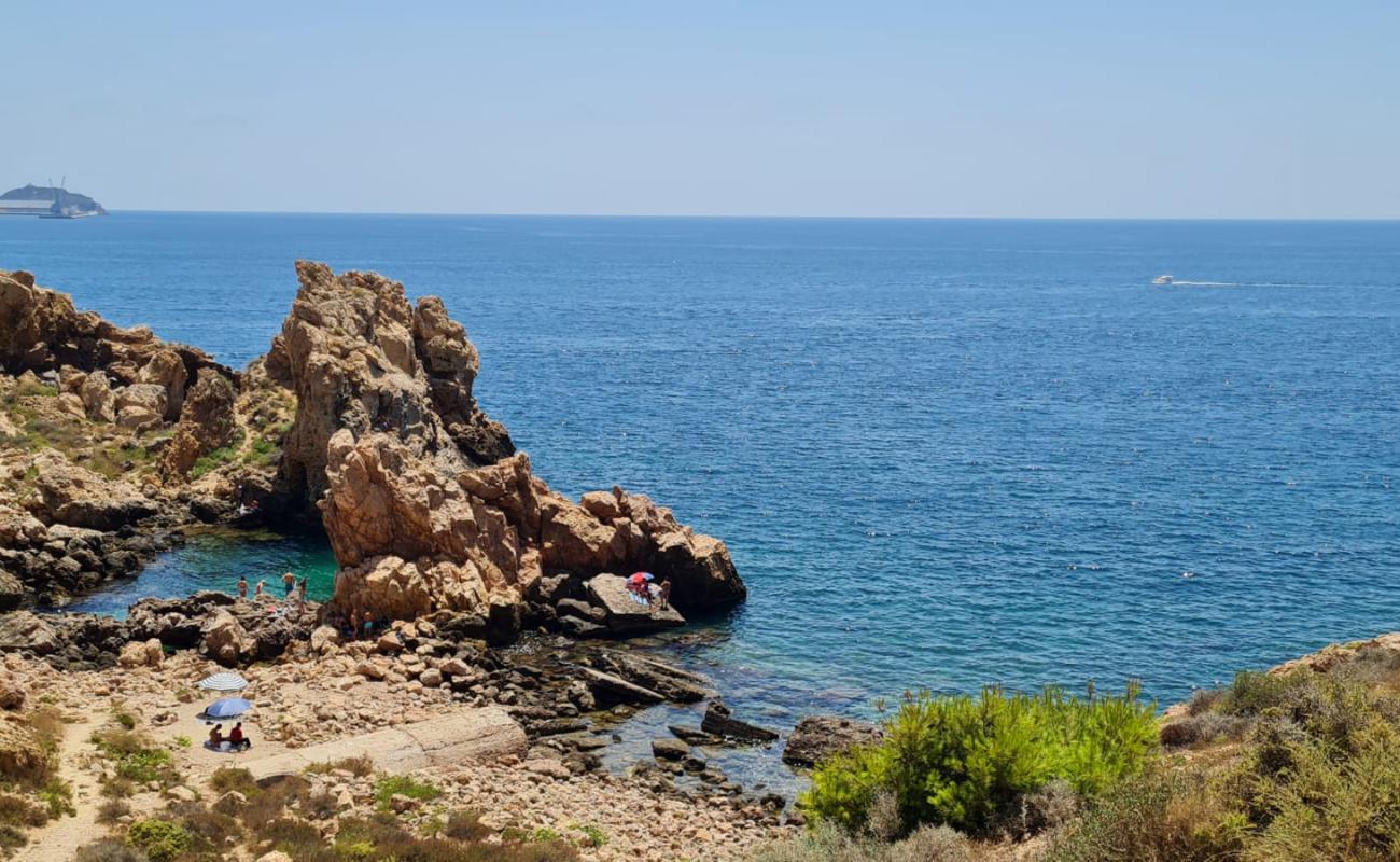 Cala del Reflector'in fotoğrafı taşlar yüzey ile