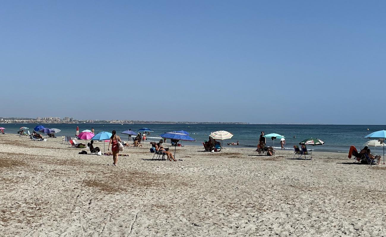 Playa de la Torre Derribada'in fotoğrafı gri kum yüzey ile