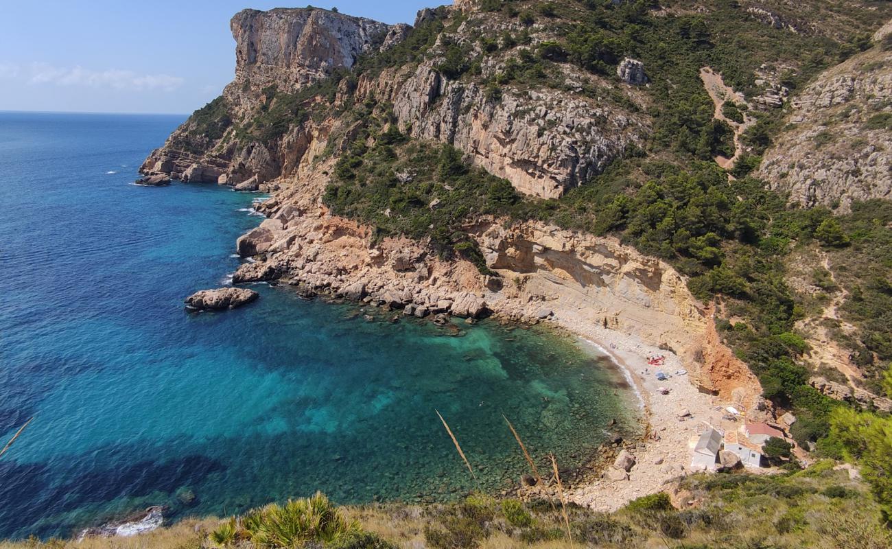 Cala Llebeig'in fotoğrafı taşlar yüzey ile