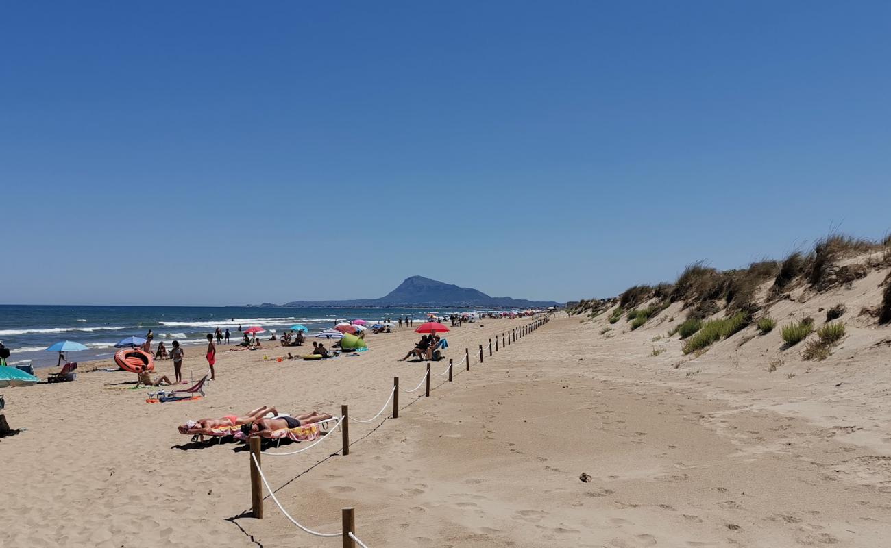 Playa Oliva Nova'in fotoğrafı parlak kum yüzey ile