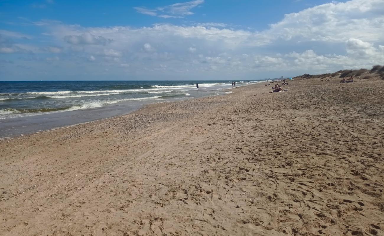 Platja de la Devesa'in fotoğrafı açık bej kum yüzey ile