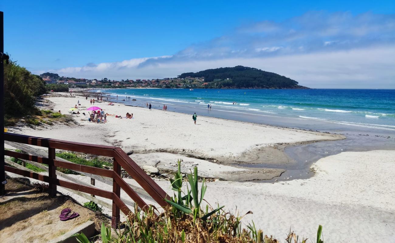 Praia de Prado'in fotoğrafı parlak kum yüzey ile