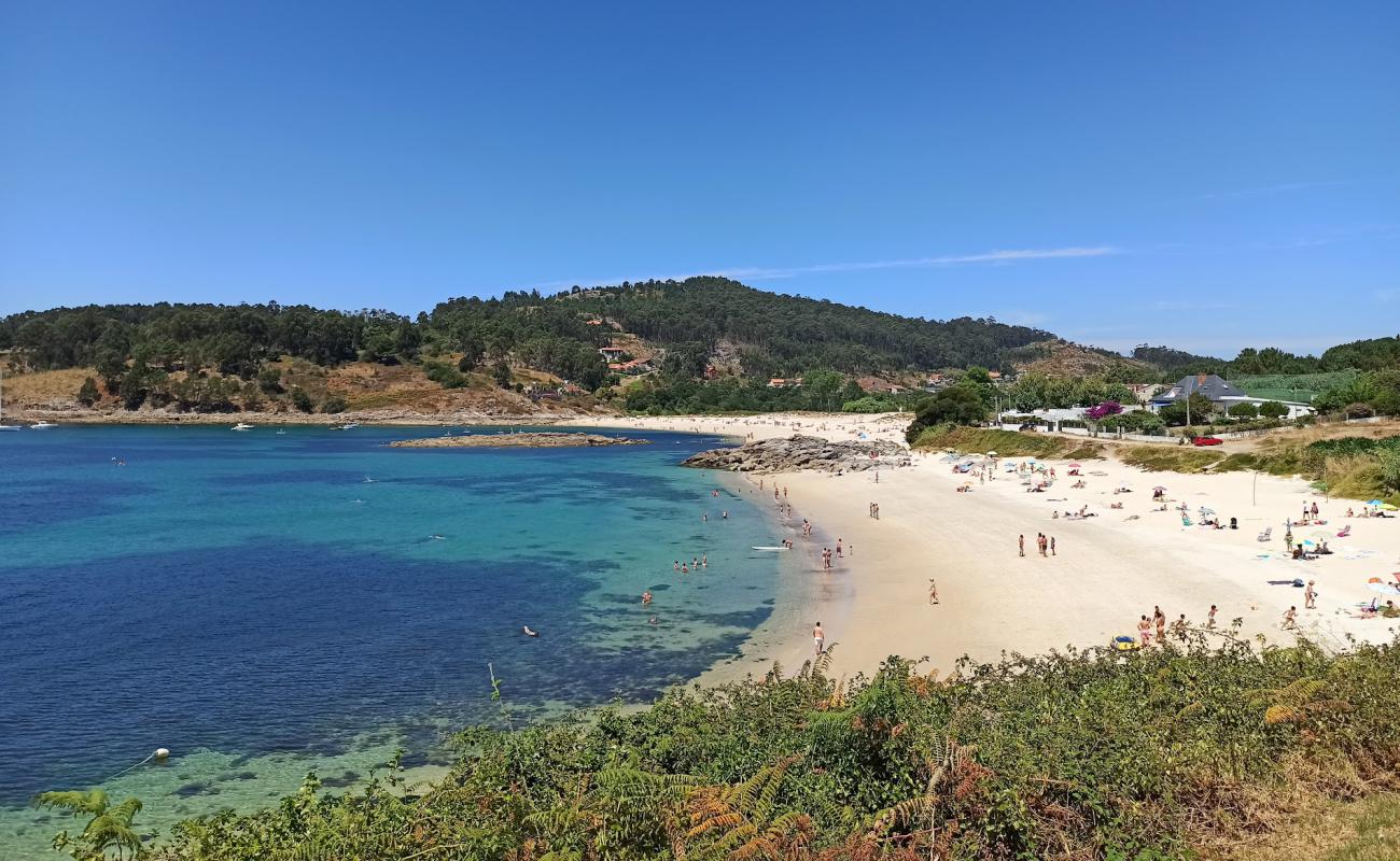 Playa de Santa Marta'in fotoğrafı parlak kum yüzey ile