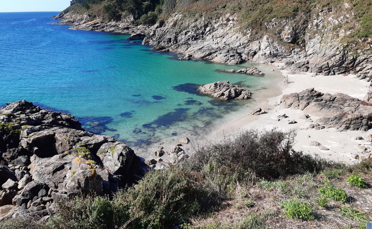 Praia Corveiro'in fotoğrafı parlak kum yüzey ile