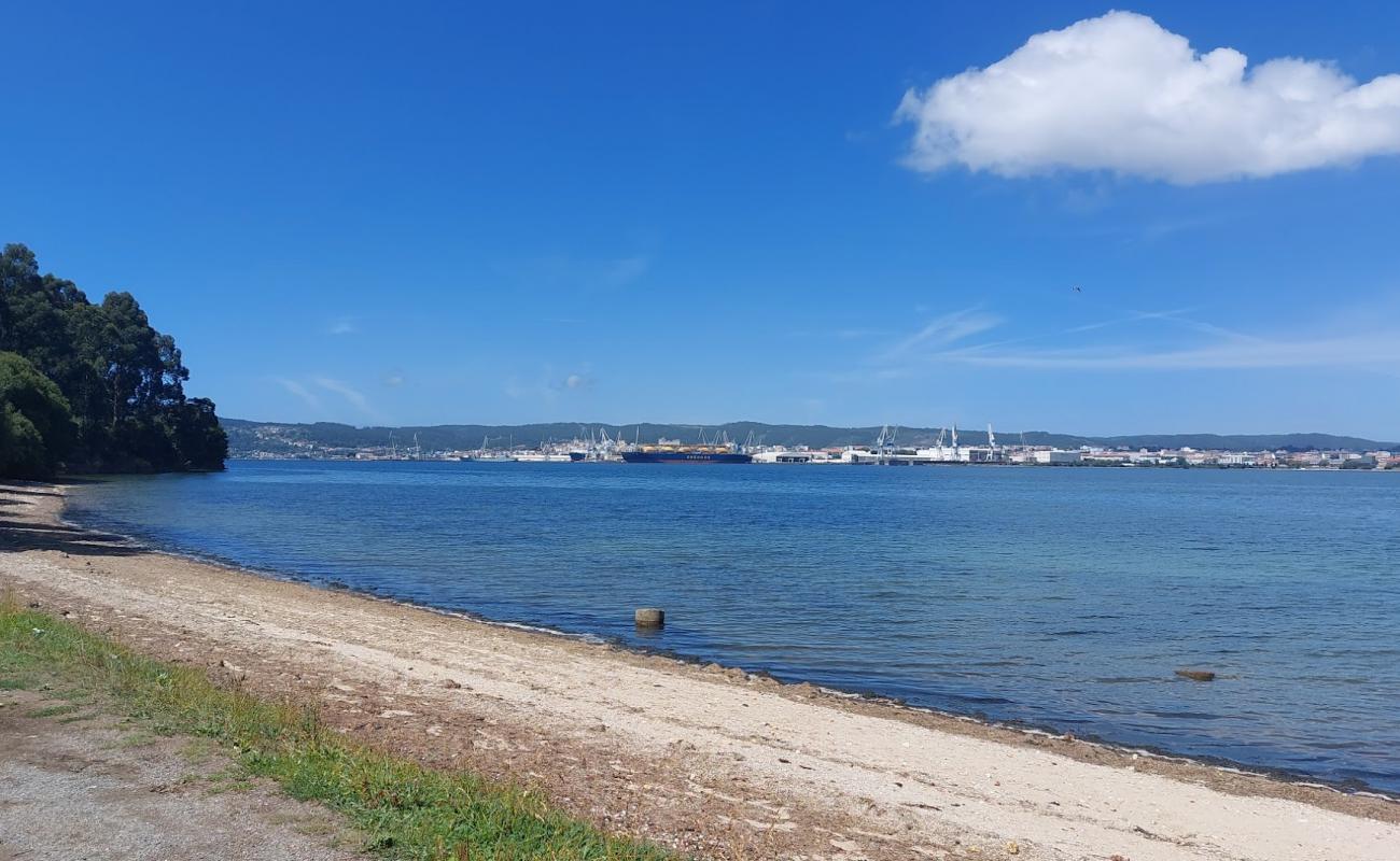 Playa de Maninos'in fotoğrafı bej kum ve kayalar yüzey ile