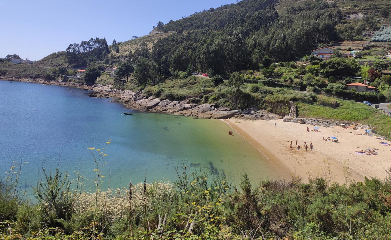 Praia de Carino'in fotoğrafı açık bej kum yüzey ile