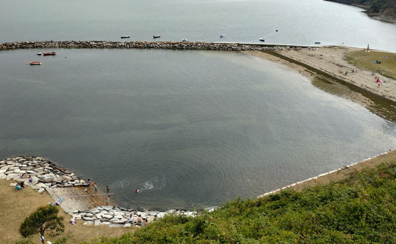 Praia dos Bloques'in fotoğrafı açık bej kum yüzey ile