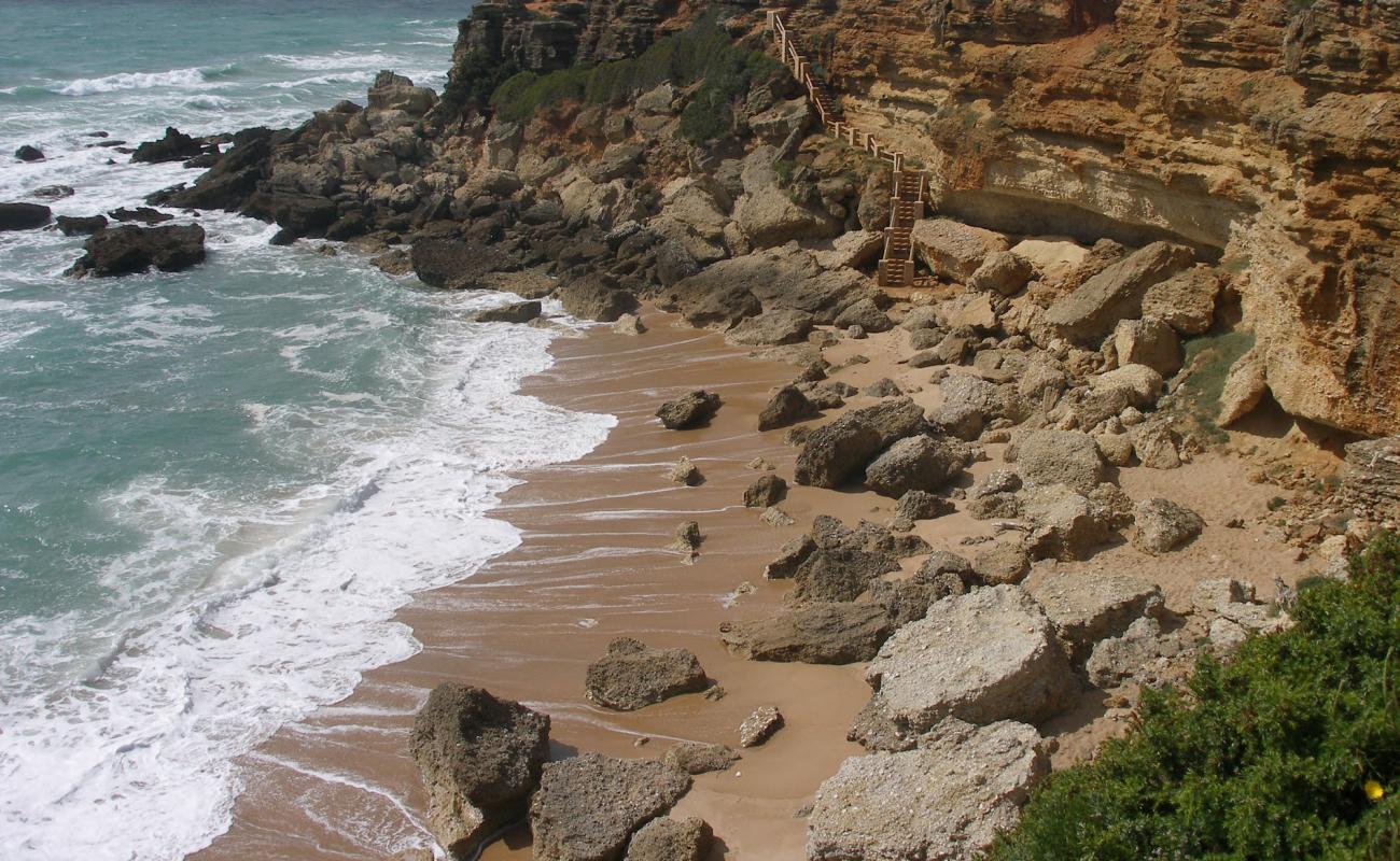 Cala de Los Pitones Beach'in fotoğrafı parlak kum yüzey ile