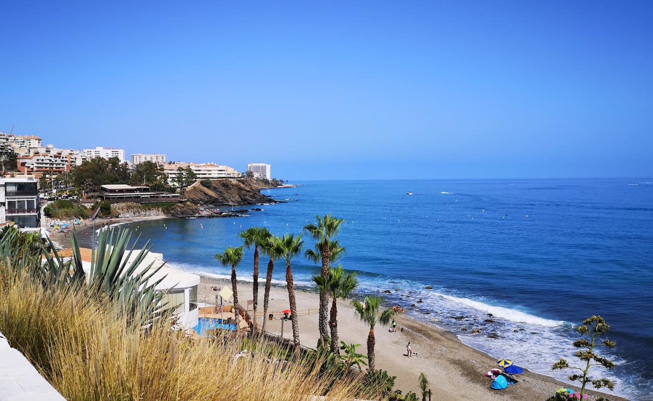 Playa de Arroyo Hondo'in fotoğrafı gri kum ve çakıl yüzey ile