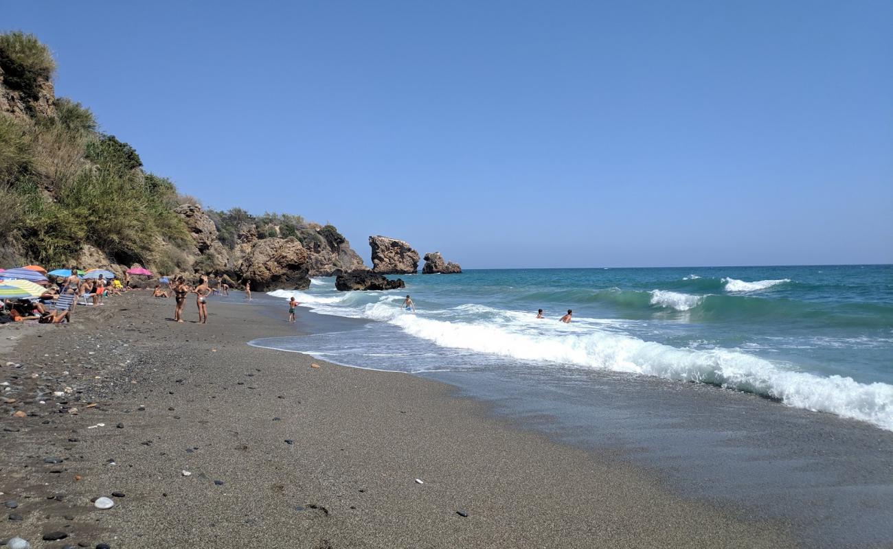 Playa de la Caleta'in fotoğrafı gri kum ve çakıllar yüzey ile