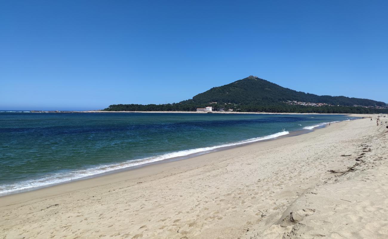 Camarido Beach'in fotoğrafı açık bej kum yüzey ile