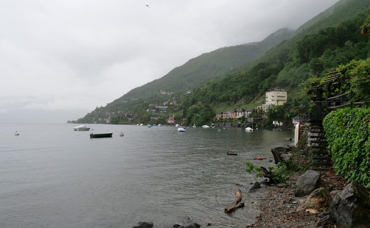 Dirinella Strand'in fotoğrafı taşlar yüzey ile