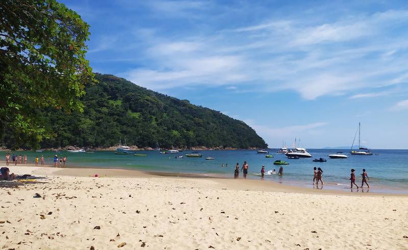 Praia das Sete Pontas'in fotoğrafı parlak ince kum yüzey ile