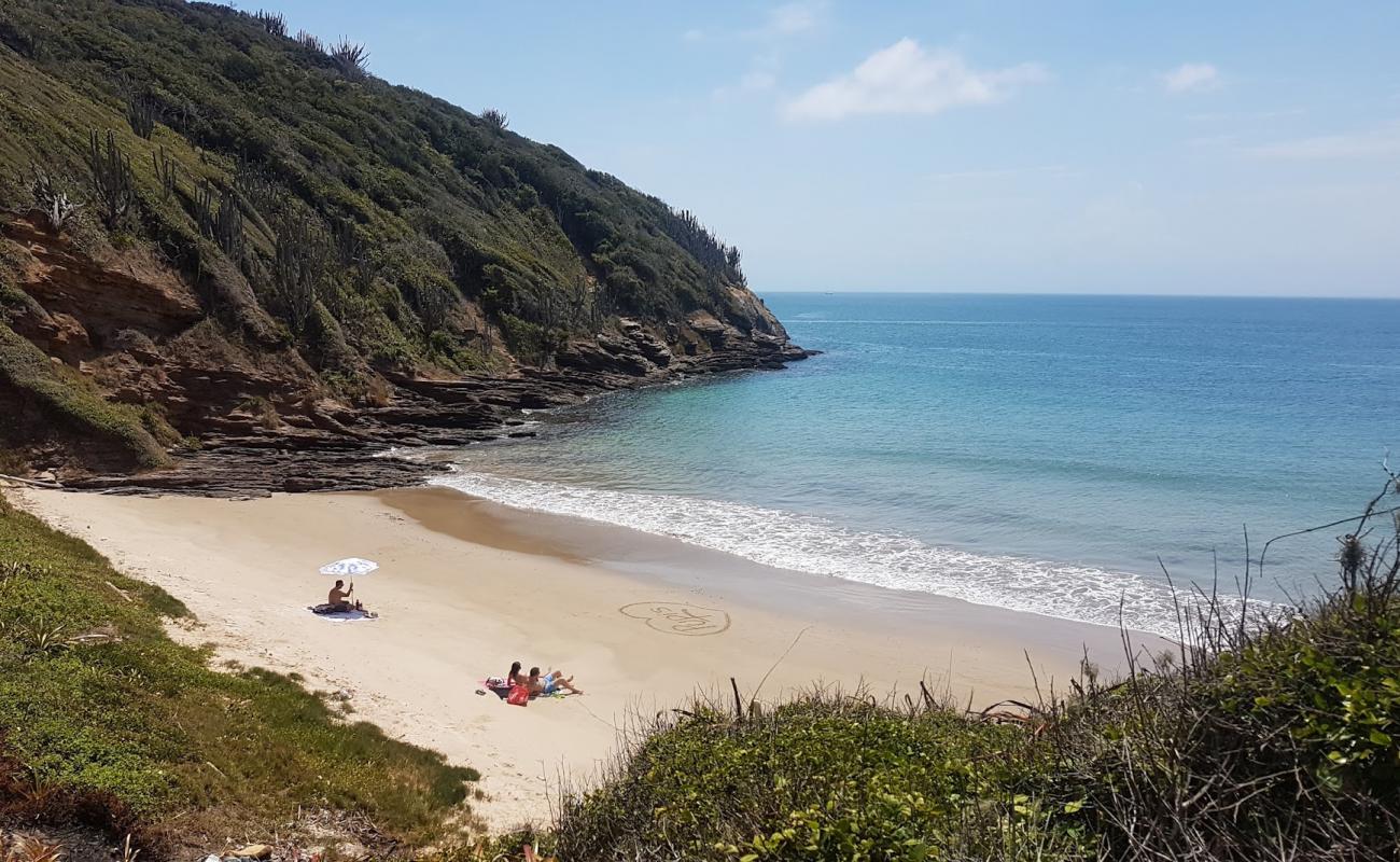 Praia dos Amores'in fotoğrafı parlak ince kum yüzey ile