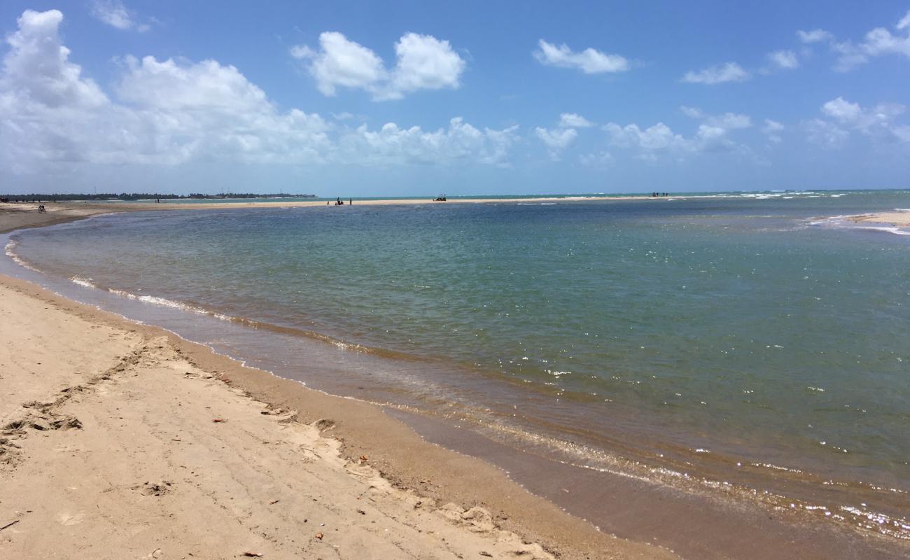 Praia Boca da Barra'in fotoğrafı parlak kum yüzey ile