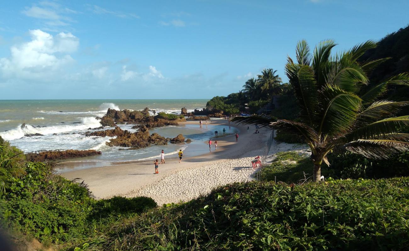 Praia de Tambaba'in fotoğrafı parlak kum yüzey ile