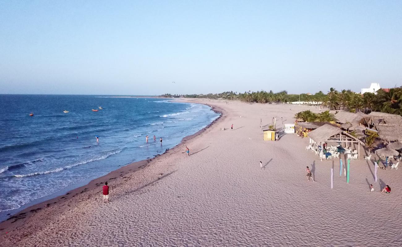 Praia do Coqueiro'in fotoğrafı parlak kum yüzey ile