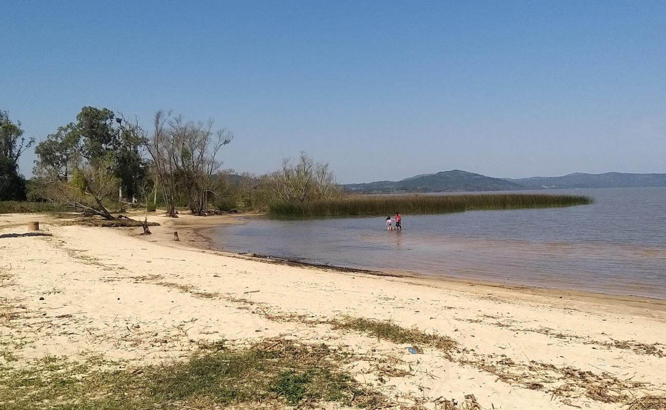 Praia de Itapua'in fotoğrafı parlak kum yüzey ile