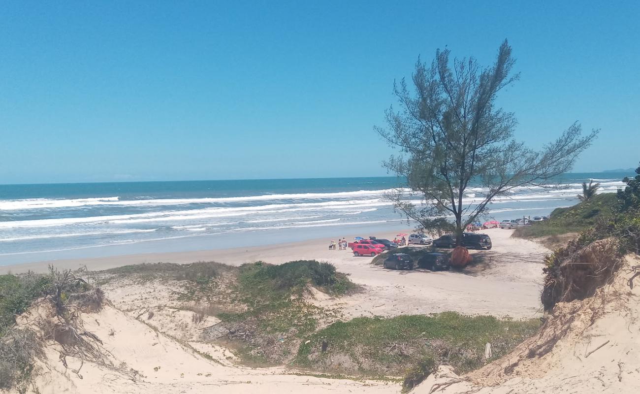Pedrinhas Beach'in fotoğrafı açık bej kum yüzey ile
