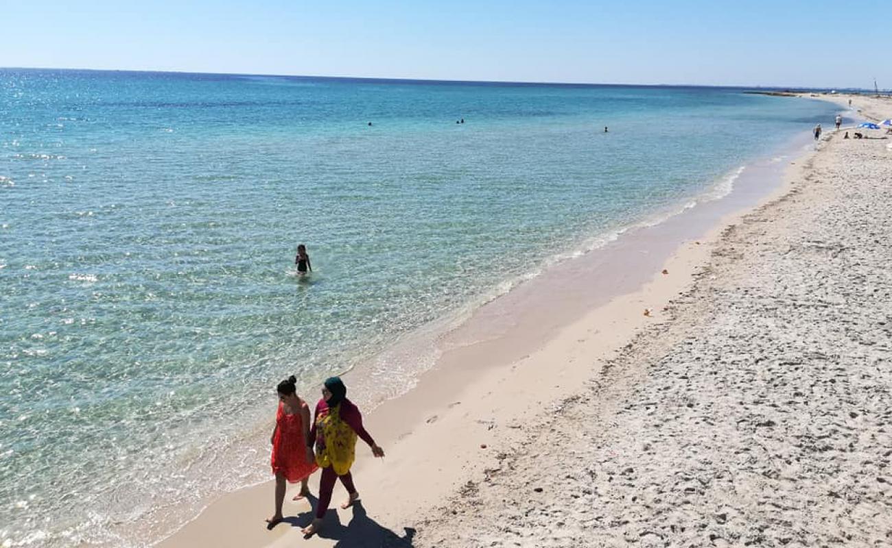 Dimas beach'in fotoğrafı beyaz ince kum yüzey ile