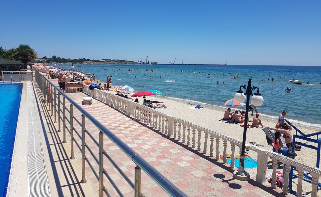 Dallas beach'in fotoğrafı açık bej kum yüzey ile