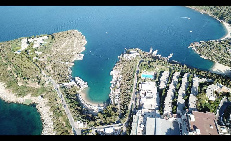 Hilton Bodrum Plajı'in fotoğrafı parlak kum yüzey ile