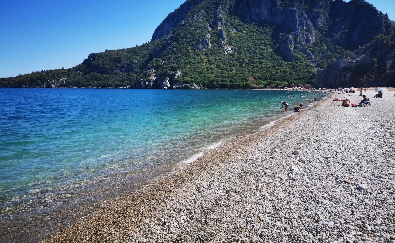 Olympos Beach'in fotoğrafı siyah kum ve çakıl yüzey ile