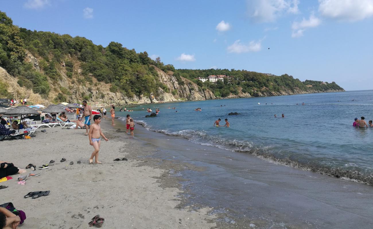 Lovers beach'in fotoğrafı açık bej kum yüzey ile