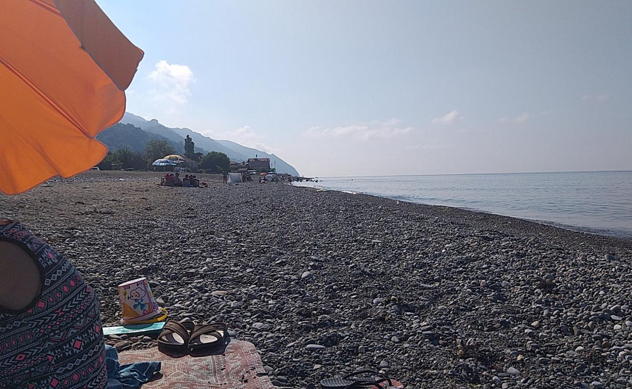 Ozluce Beach'in fotoğrafı gri çakıl taşı yüzey ile